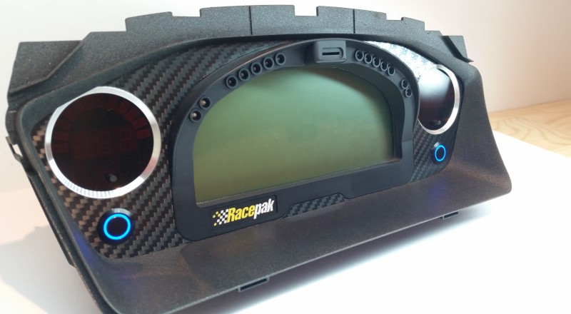 A Custom Cluster built for a Mitsubishi Evolution 8 to hold a Racepak IQ3 Display Dash Left View