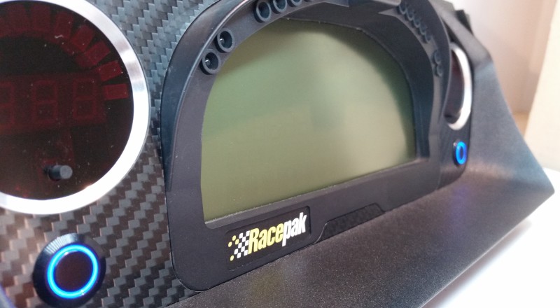 A Custom Cluster built for a Mitsubishi Evolution 8 to hold a Racepak IQ3 Display Dash Close Up Left