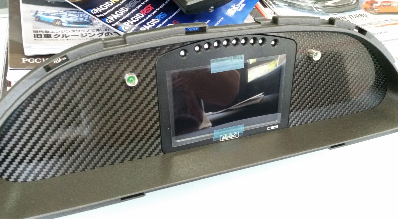 A Custom Cluster built for a S13, 180sx or 240sx with a Motec C125 Display Dash Installed Left 2