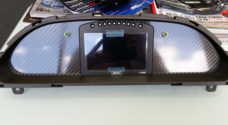 A Custom Cluster built for a S13, 180sx or 240sx with a Motec C125 Display Dash Installed Front 1