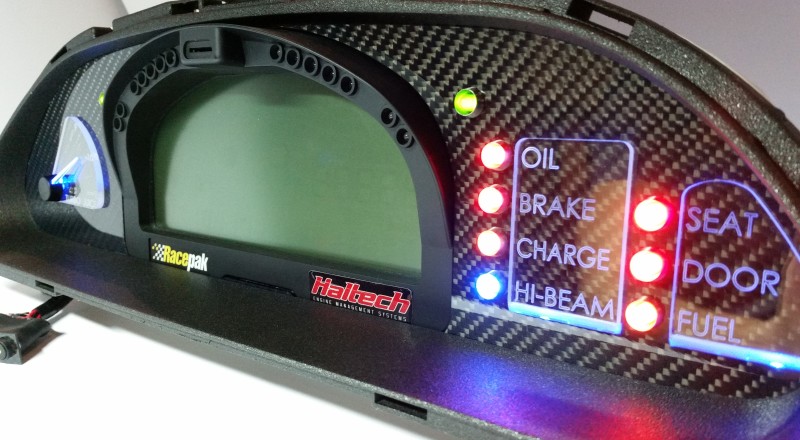 A Custom Cluster Built for A Nissan S13,180sx or 240sx to hold a Racepak IQ3 Display Dash Turbo Juice Right Blue