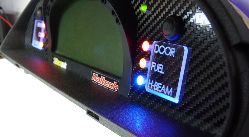 A Custom Cluster Built for A Nissan S13,180sx or 240sx to hold a Racepak IQ3 Display Dash and utilise the factory Odometer Right