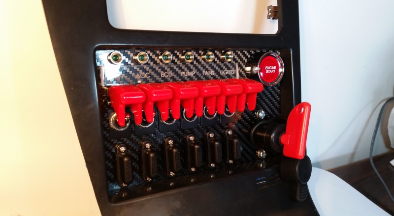 A Custom Switch Panel Built for A Nissan S13,180sx or 240sx to be installed in the factory radio location 2