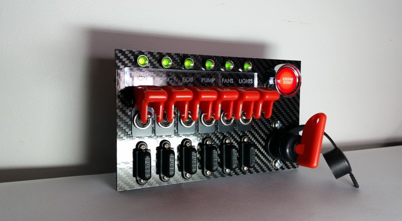 A Custom Switch Panel Built for A Nissan S13,180sx or 240sx to be installed in the factory radio location Left view triggered