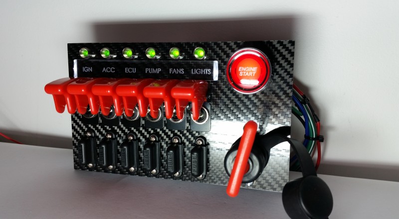 A Custom Switch Panel Built for A Nissan S13,180sx or 240sx to be installed in the factory radio location Right view triggered