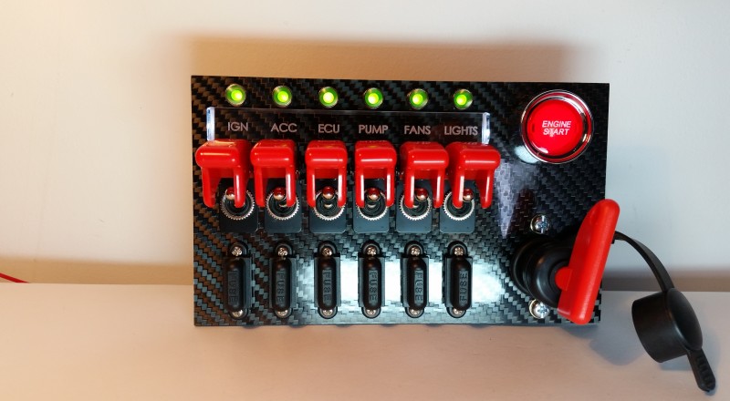 A Custom Switch Panel Built for A Nissan S13,180sx or 240sx to be installed in the factory radio location Front view triggered