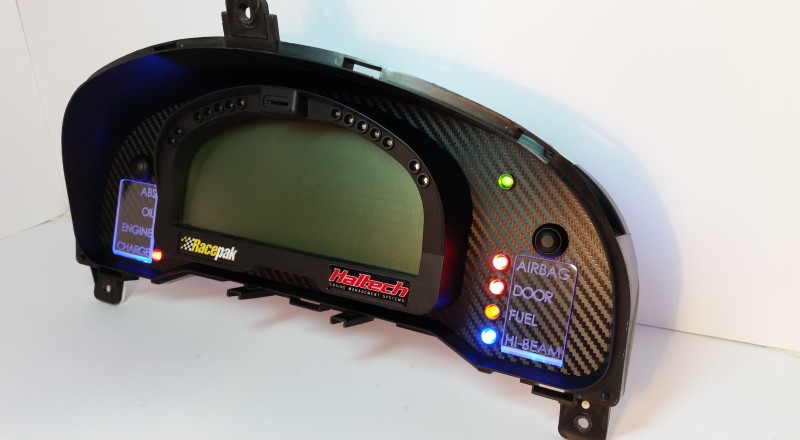 A Custom Cluster with a Racepak IQ3 Display built for a nissan S15 Sivia 200sx with Blue illumination Right 2