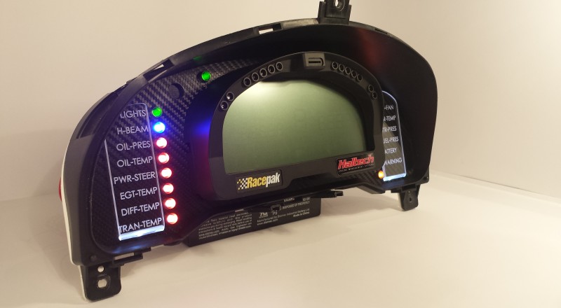 A Custom Cluster with a Racepak IQ3 Display built for a Nissan S15 Sivia 200sx with Multiple Indicators Left