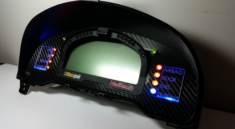 A Custom Cluster with a Racepak IQ3 Display built for a Nissan S15 Sivia 200sx with Blue LED illumination Side