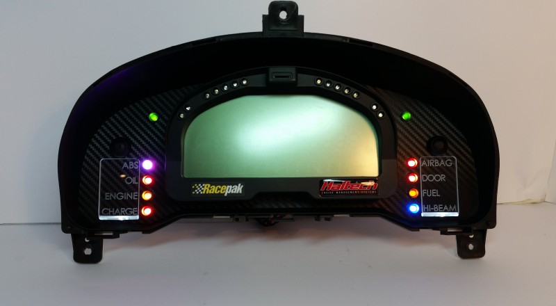 A Custom Cluster with a Racepak IQ3 Display built for a nissan S15 Sivia 200sx with White illumination Front