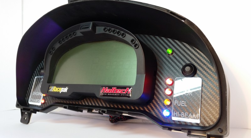 A Custom Cluster with a Racepak IQ3 Display built for a nissan S15 Sivia 200sx with White illumination Right